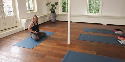 Yogakurs - vorhandenes Yogazubehör: Sitz- / Meditationskissen - Wien - Elljo Yoga