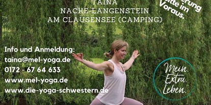 Yogakurs - Yogastil: SUP-Yoga - Pfalz - Taina beim SUP-Yoga "Heldenstellung"  - Mein.Extra.Leben.Yoga© Taina Nacke-Langenstein