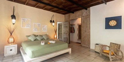 Yogakurs - Einzelzimmer in der Villa mit Klimaanlage. - Yoga Retreat Bali 2023