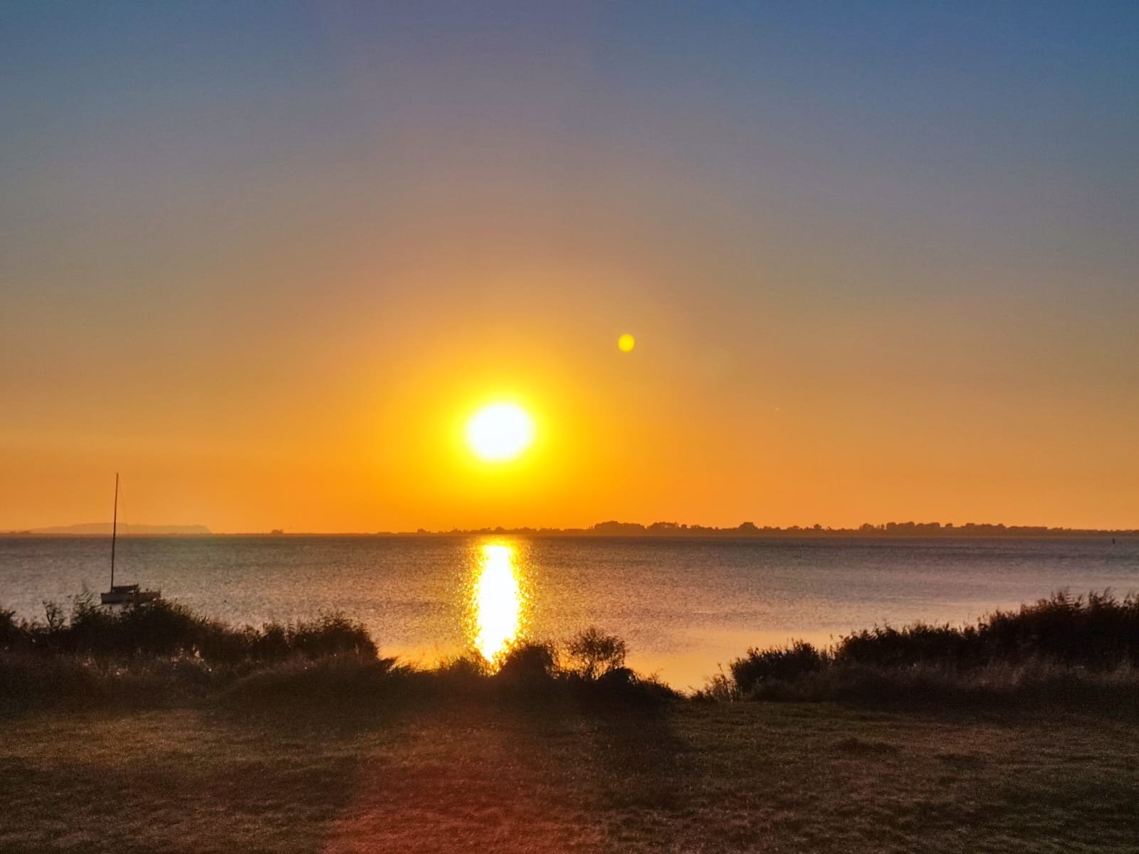 Yogaevent: Sonnenuntergan Wiek Rügen Bodden - Bildungsurlaub auf Rügen - Yoga Lotse- Yoga Ausgleichs-Übungen am Arbeitsplatz
