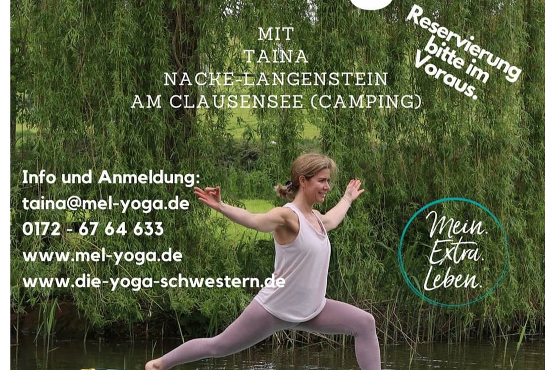 Yoga: Taina beim SUP-Yoga "Heldenstellung"  - Mein.Extra.Leben.Yoga© Taina Nacke-Langenstein